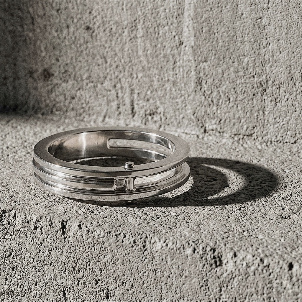 Three-band rigid ring with riveted structural vertex resting on concrete, A Gross Domestic Product