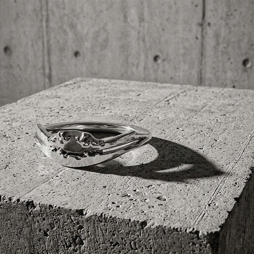 Textured ring with organic raised ridge at the crown on concrete surface, A Gross Domestic Product
