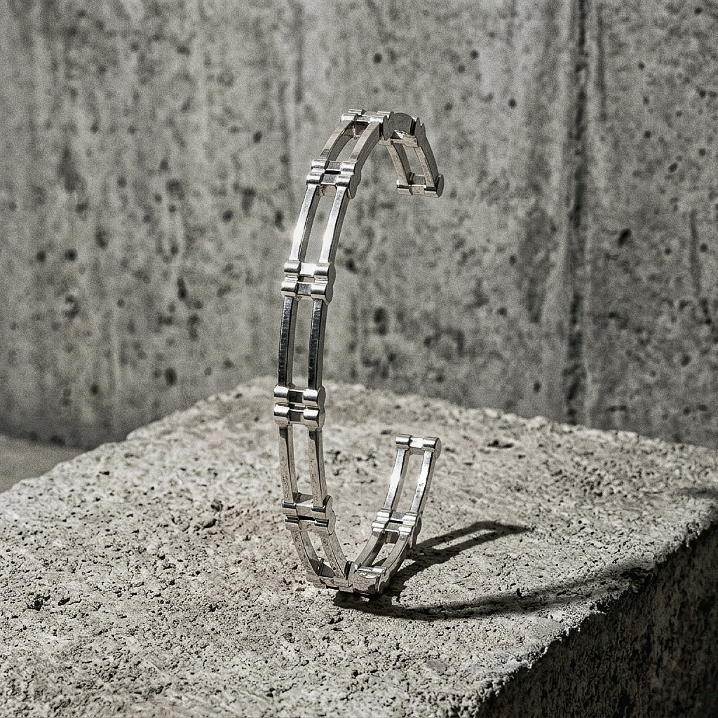 6mm wide open cuff standing on concrete, A Gross Domestic Product