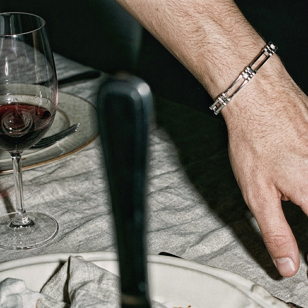 Ten Cuff Bracelet in sterling silver worn on male wrist — A Gross Domestic Product